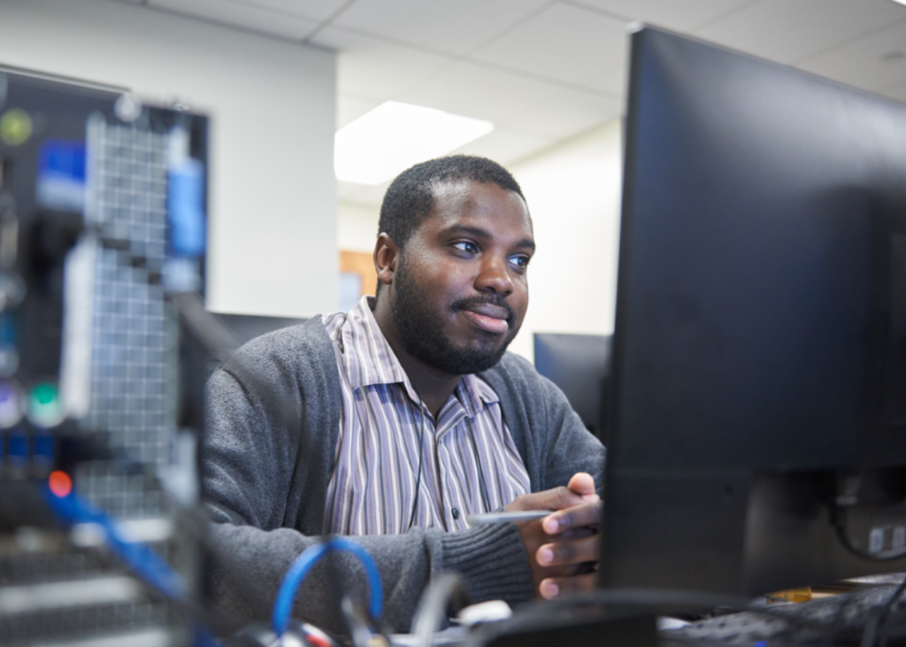 Per Scholas community member learning IT skills